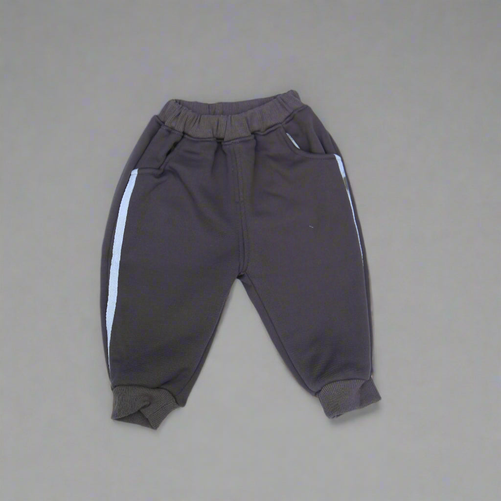 Pair of brown pants on a light blue background