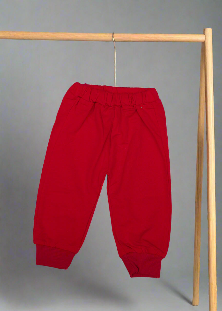 Red pants on a light blue background