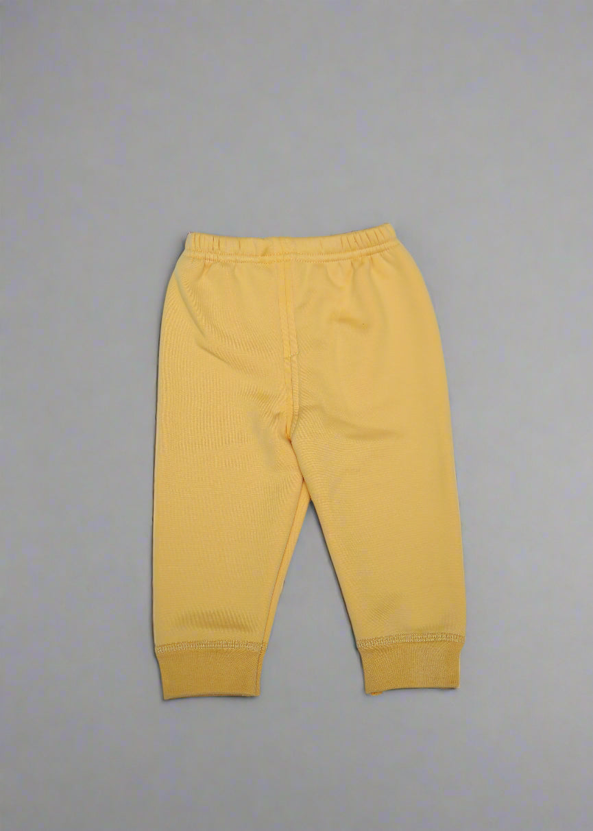 Yellow pants on a light blue background