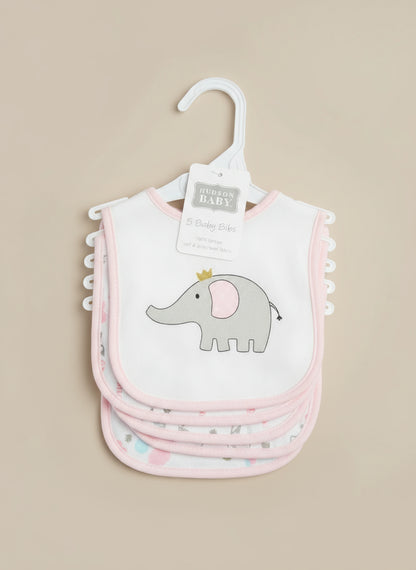 Set of baby bibs with an elephant design on a hanger against a textured surface