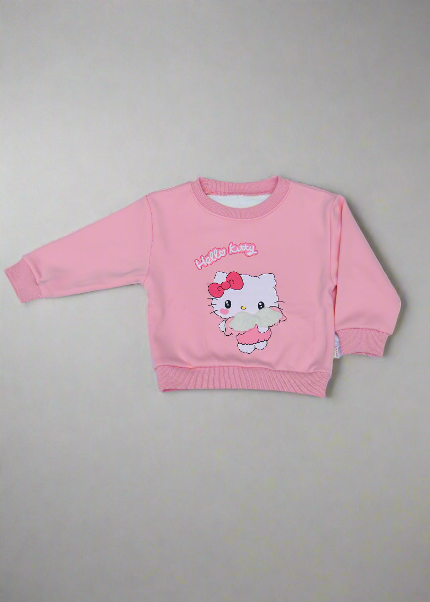 Pink children's outfit with cartoon character on a light  background