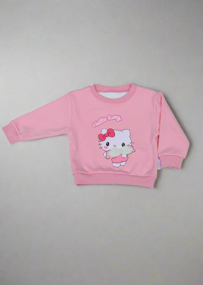 Pink children's outfit with cartoon character on a light  background
