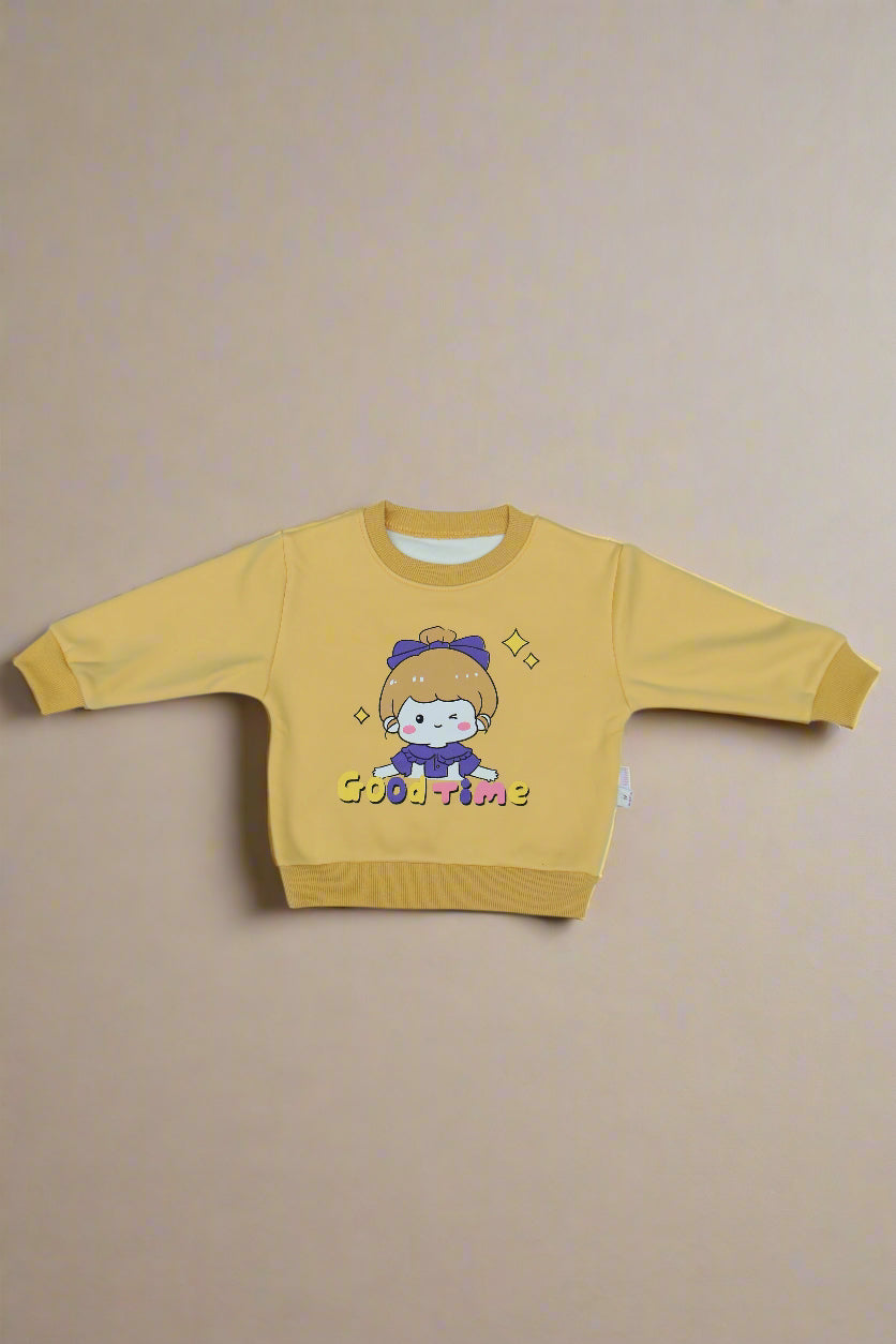 Yellow sweatshirt with cartoon design on a light  background