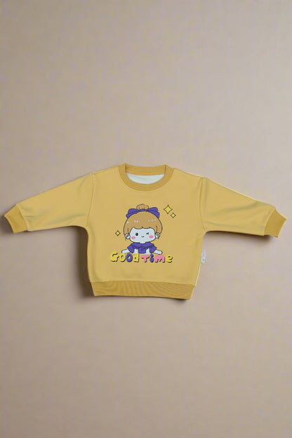 Yellow sweatshirt with cartoon design on a light  background