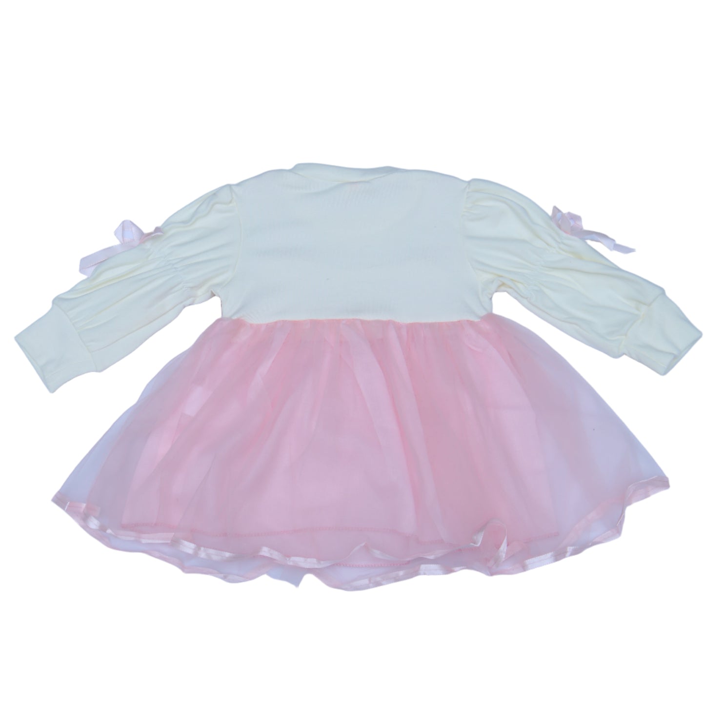 Light pink and white dress with a sheer overlay on a light bbackground