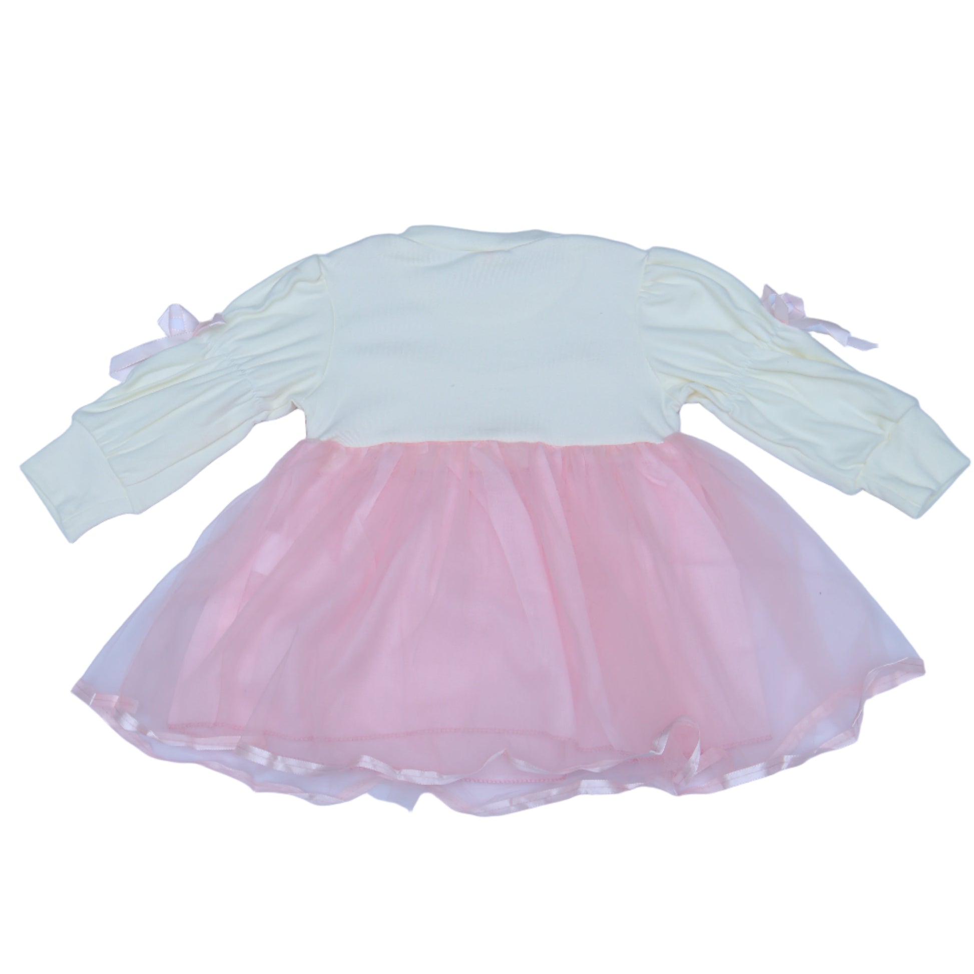 Light pink and white dress with a sheer overlay on a light bbackground