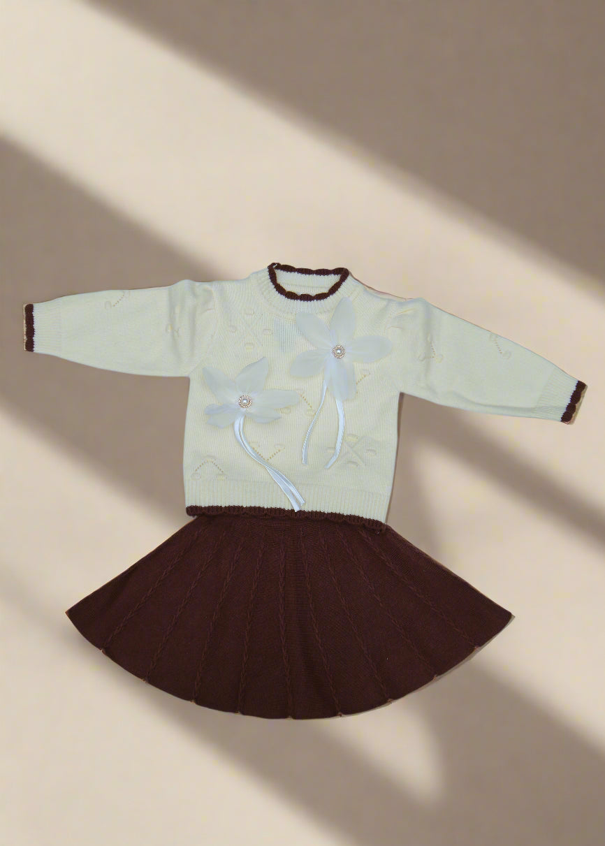 White garment with brown accents on a white