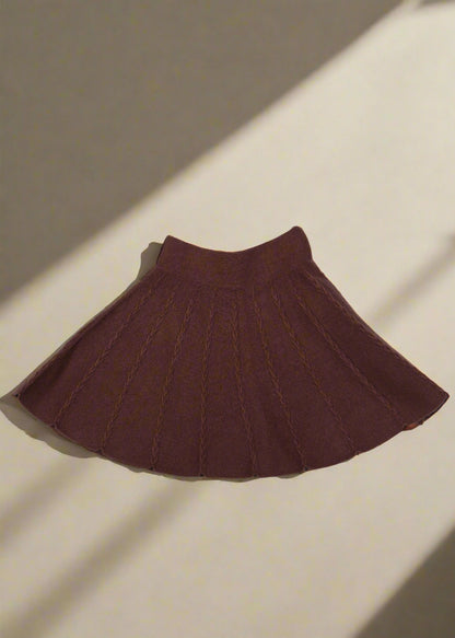 Brown knit fabric on a white background