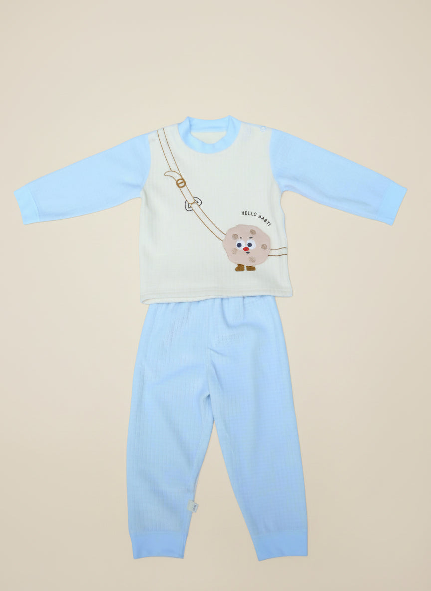 Light blue baby outfit with a cartoon design on a white background