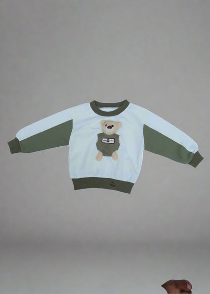 Children's pajama set with bear design on a white background