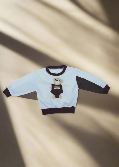 Children's onesie with bear design on a white background