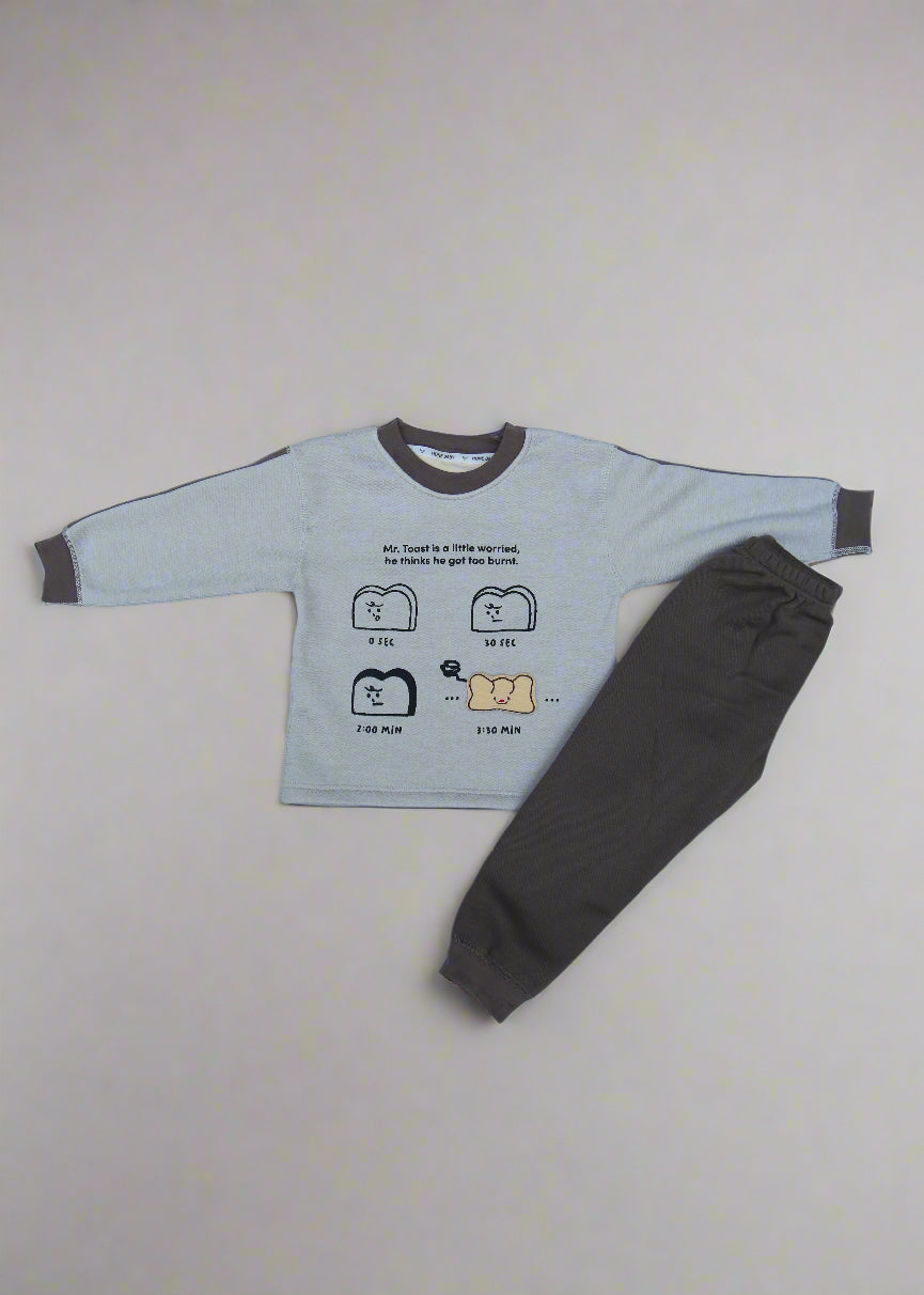 Gray sweatshirt with cartoon design on a white surface