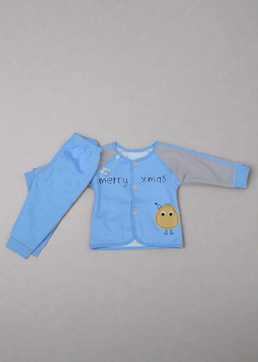 Children's blue outfit with cartoon design on a white surface