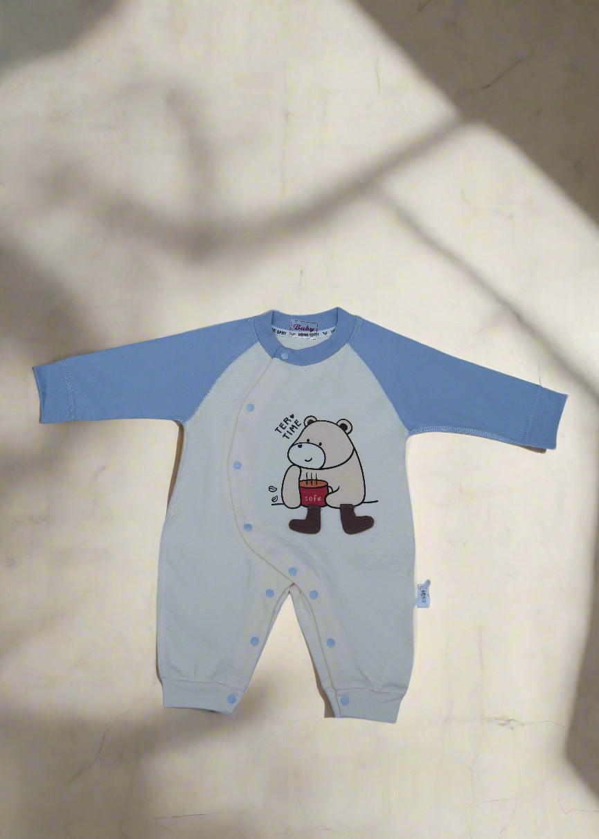 Children's long-sleeve shirt with a cartoon design on a light blue background