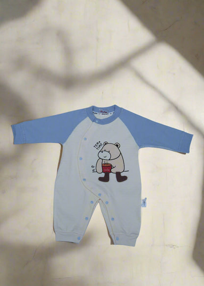 Children's long-sleeve shirt with a cartoon design on a light blue background
