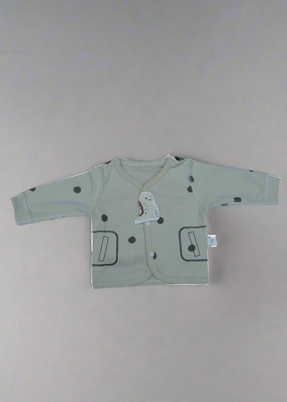 Light-colored baby romper with cartoon designs on a white background