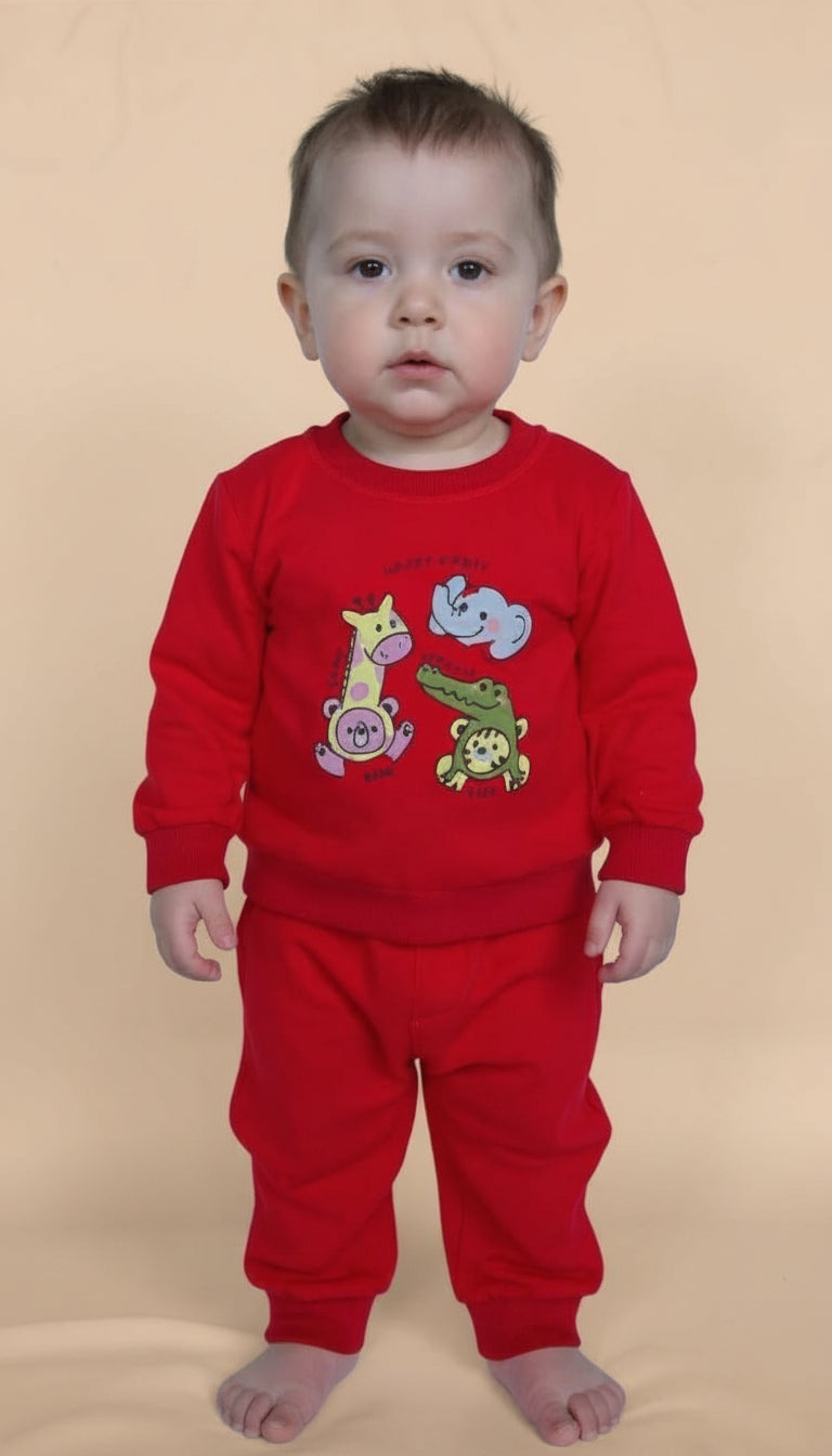 Child wearing a red outfit with animal designs on a white background