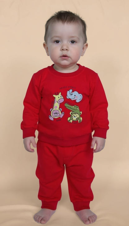 Child wearing a red outfit with animal designs on a white background