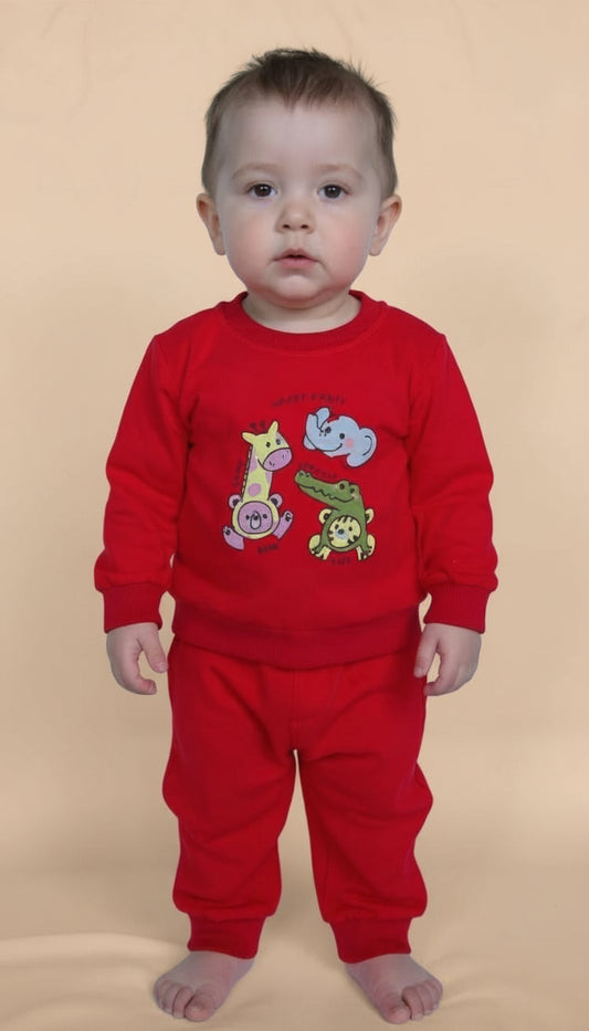 Child wearing a red outfit with animal designs on a white background