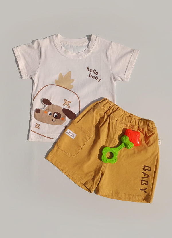 Children's t-shirt with a dog graphic and shorts on a yellow and blue background